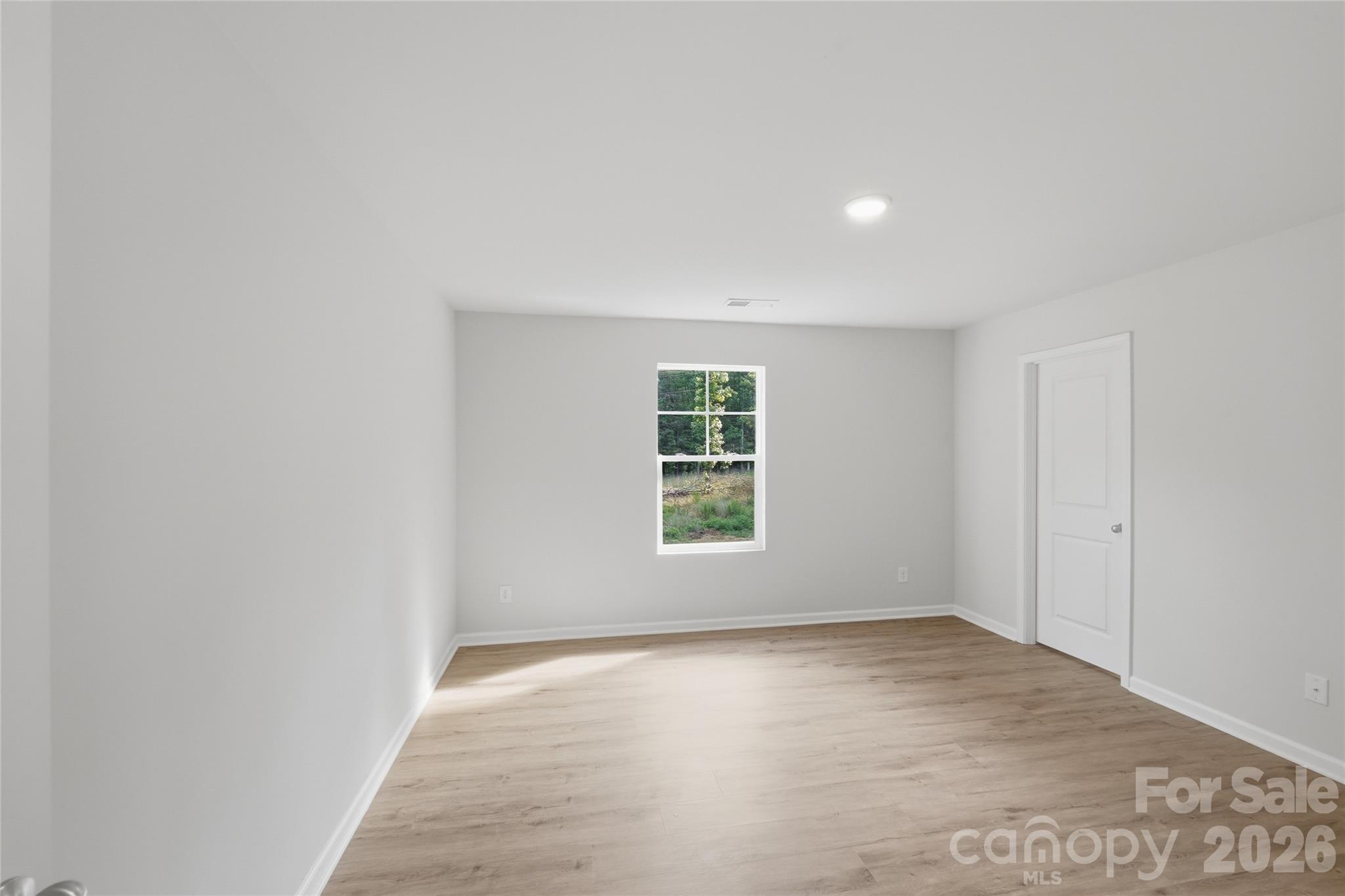 242 Landers Chapel Road Lincolnton, NC 28092 - Photo 4 of 33 an empty room with a window