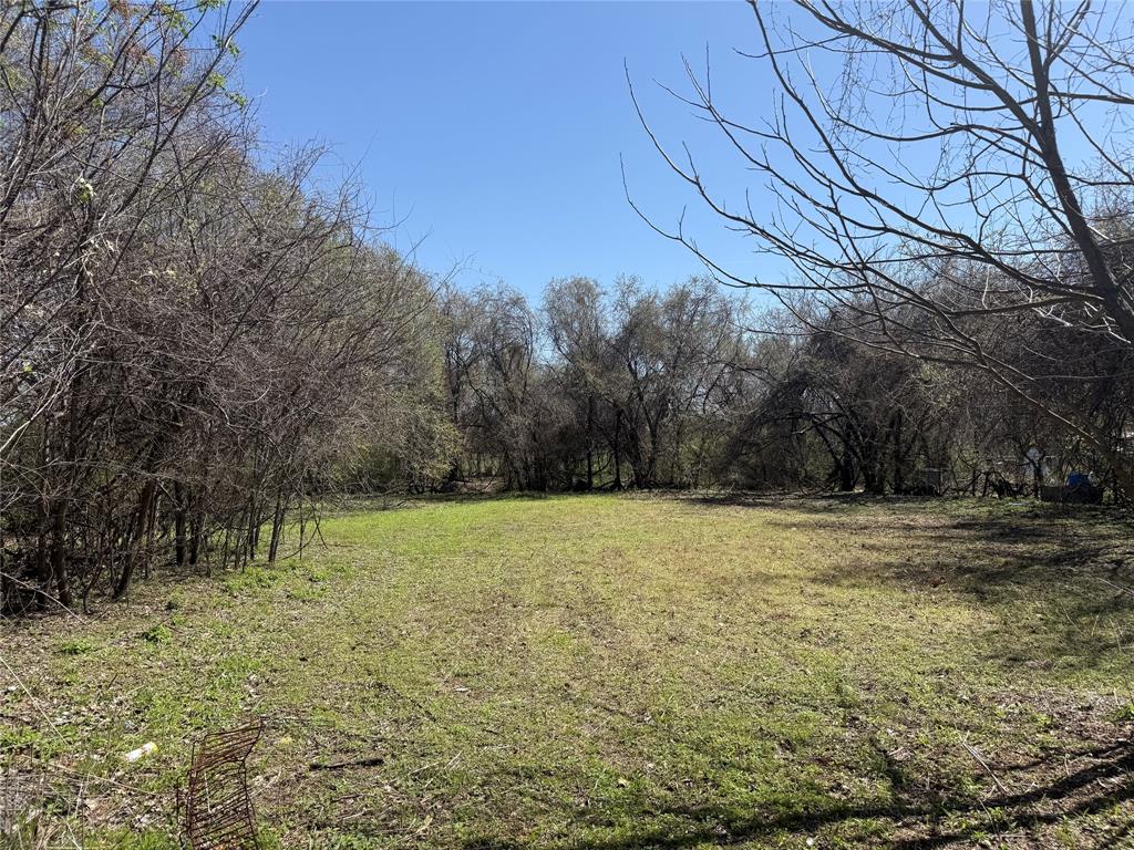 3216 House Anderson Road Fort Worth, TX 76040 - Photo 2 of 7 a view of a yard with an trees