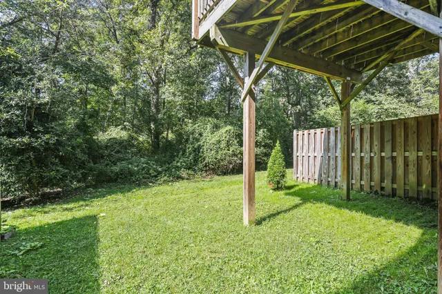 a view of a backyard with green space