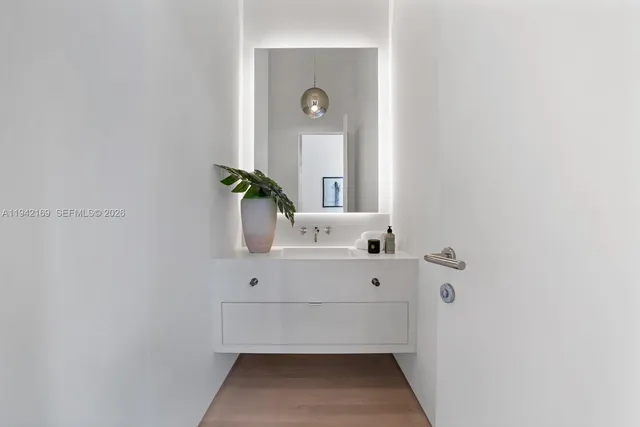 a view of hallway with mirror