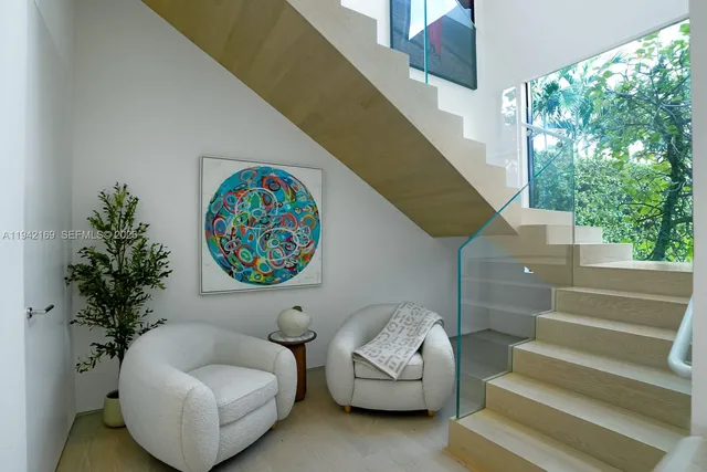 a view of entryway with stairs and a couch