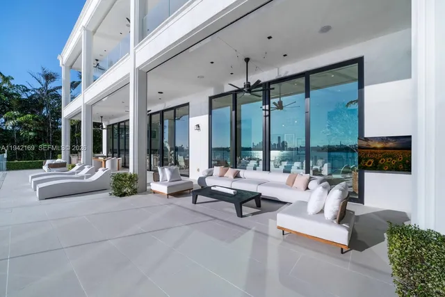 a building outdoor space with patio couch and outdoor view