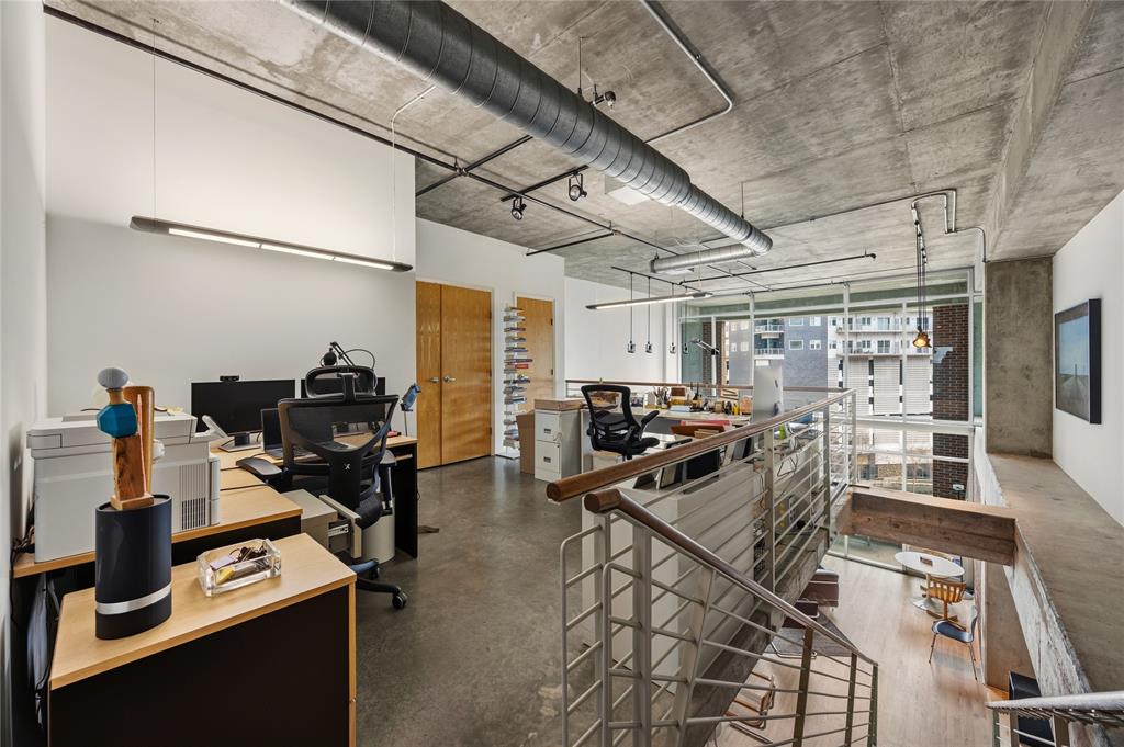 2011 Cedar Springs Road, Unit 305 Dallas, TX 75201 - Photo 15 of 27 Multi-level office space featuring concrete ceilings, exposed ductwork, and track lighting