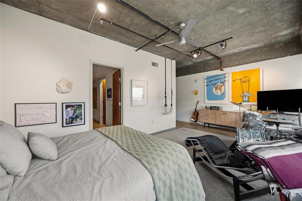2011 Cedar Springs Road, Unit 305 Dallas, TX 75201 - Photo 20 of 27 Concrete ceiling with exposed conduit, recessed lighting, and a ceiling fan