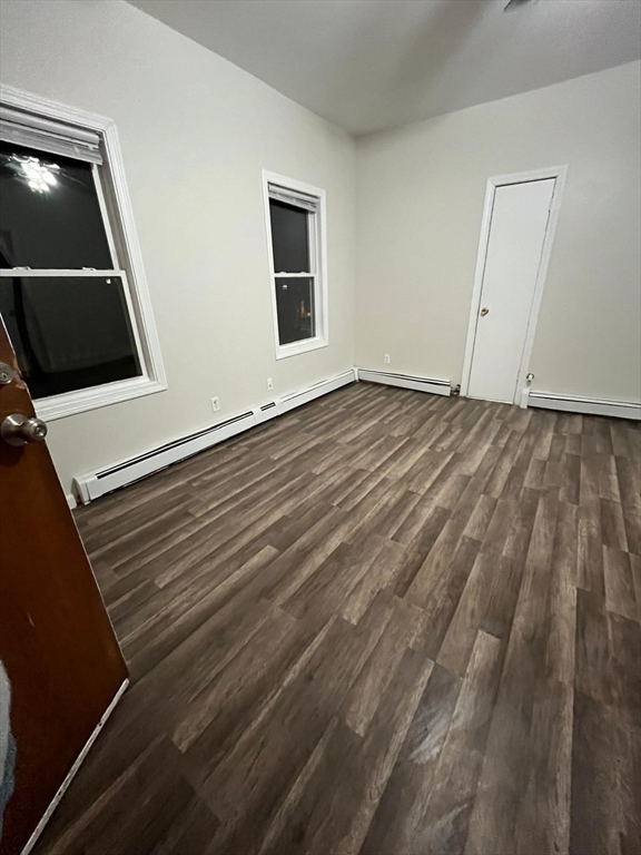 286 Griffin Street, Unit 2 Fall River, MA 02724 - Photo 3 of 9 a view of outdoor space with wooden floor