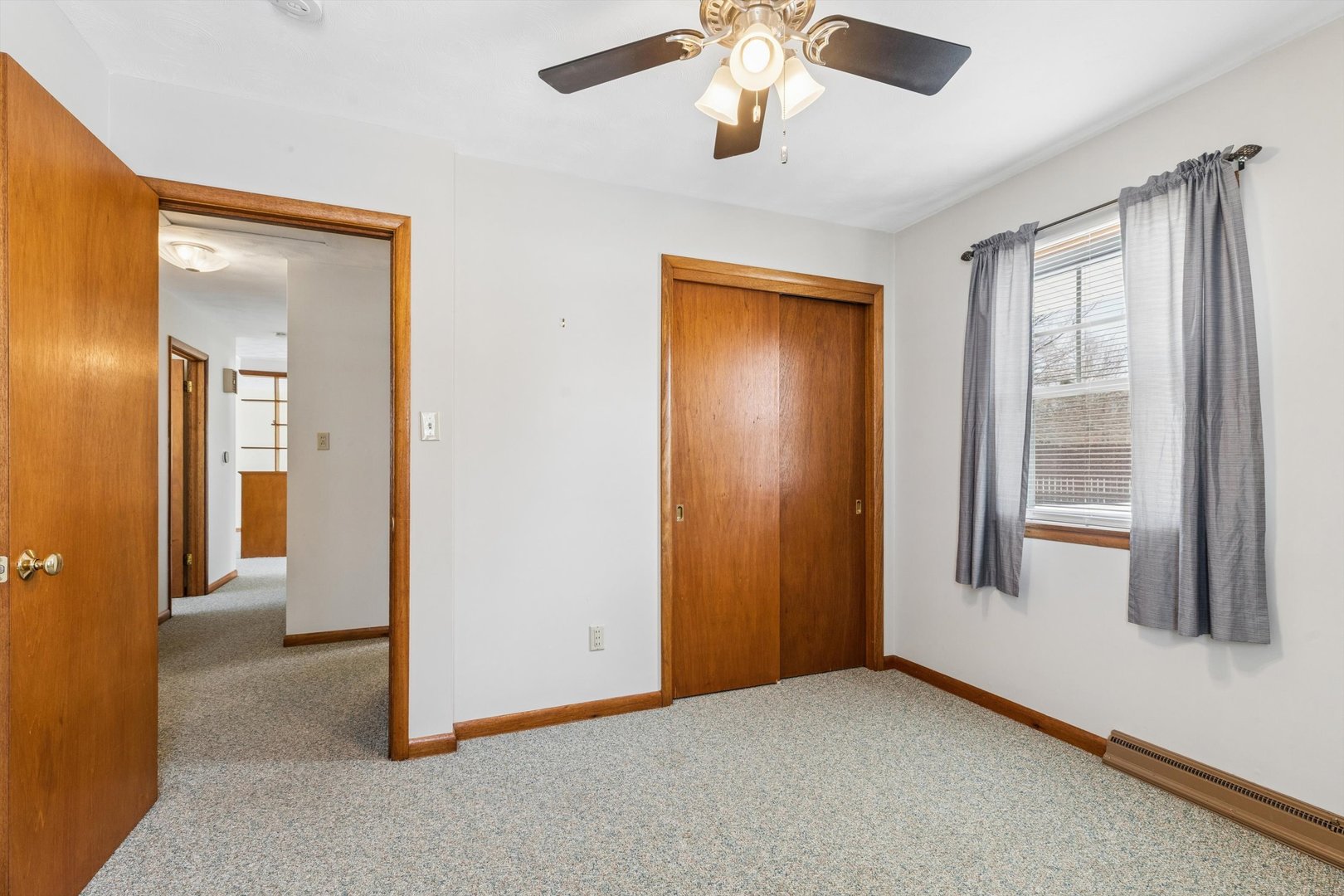 1245 8th Avenue North Clinton, IA 52732 - Photo 19 of 32 an empty room that has a window and kitchen view