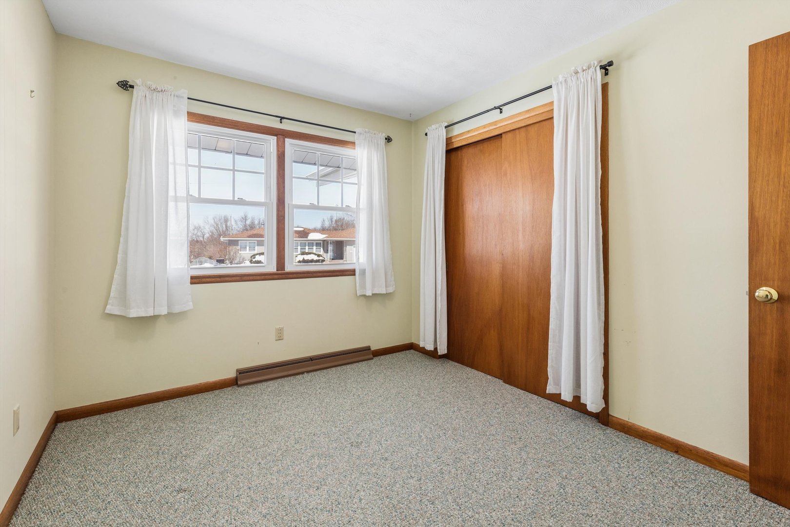 1245 8th Avenue North Clinton, IA 52732 - Photo 21 of 32 an empty room with windows