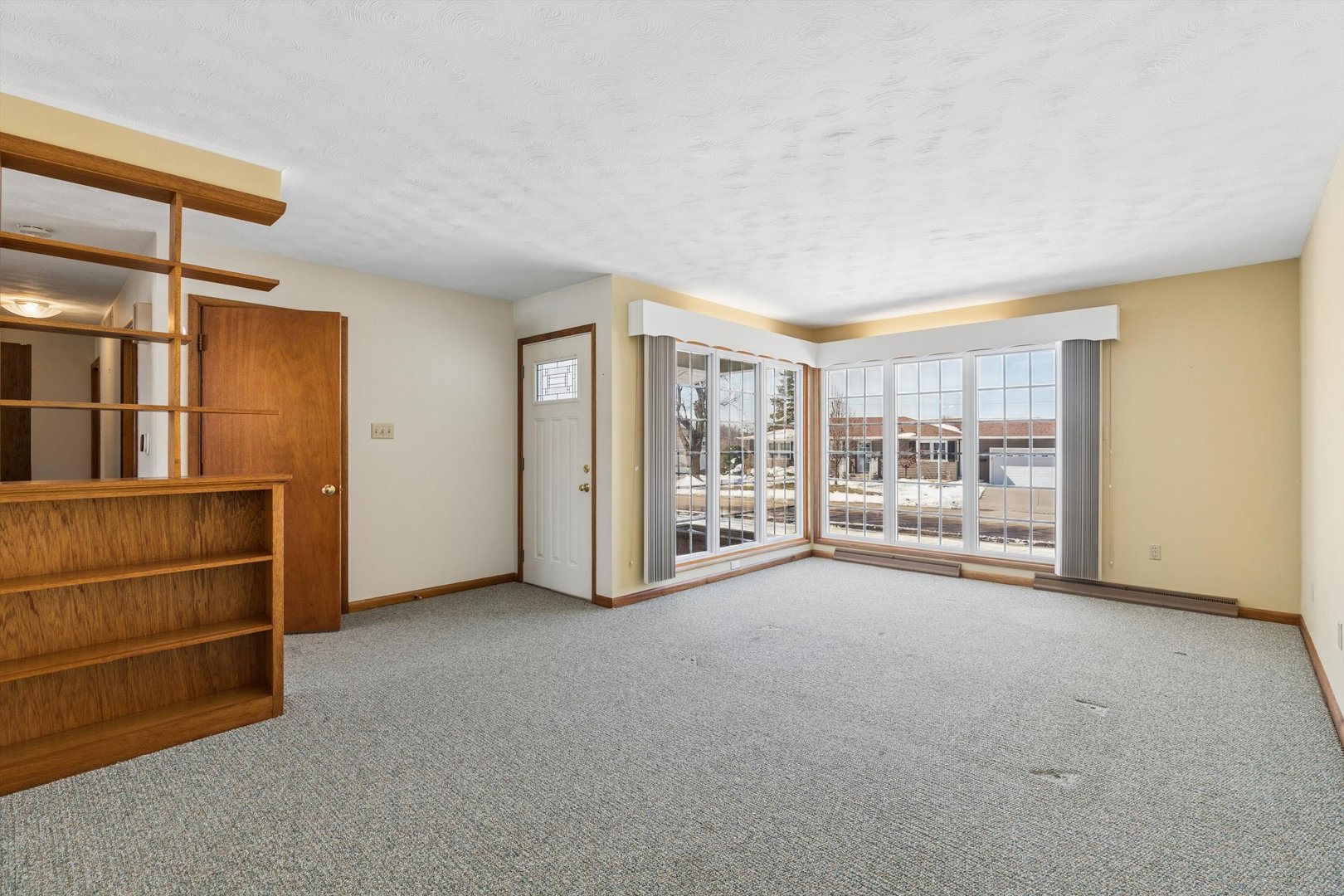 1245 8th Avenue North Clinton, IA 52732 - Photo 5 of 32 a view of an empty room with a window