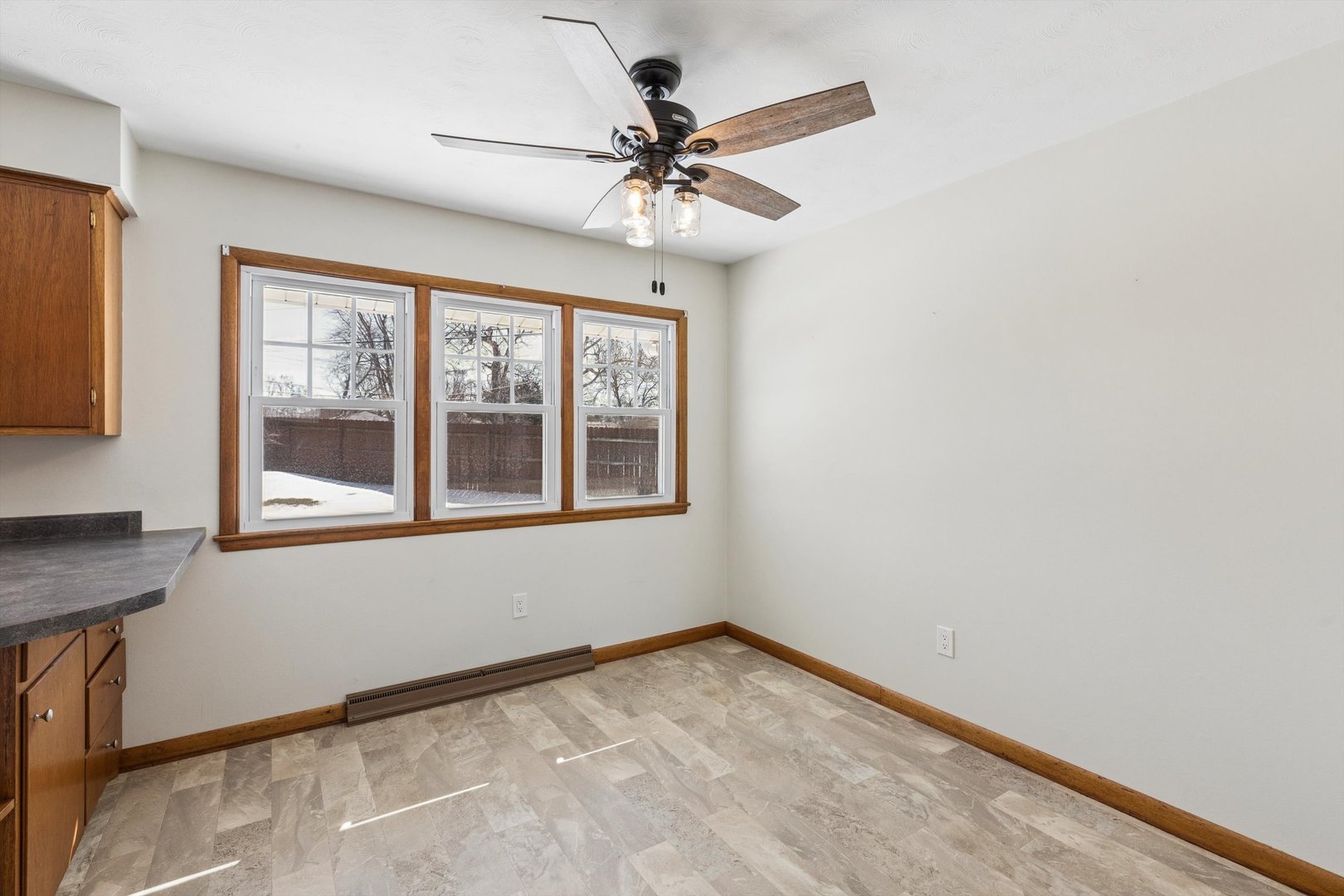 1245 8th Avenue North Clinton, IA 52732 - Photo 8 of 32 a view of an empty room with a window