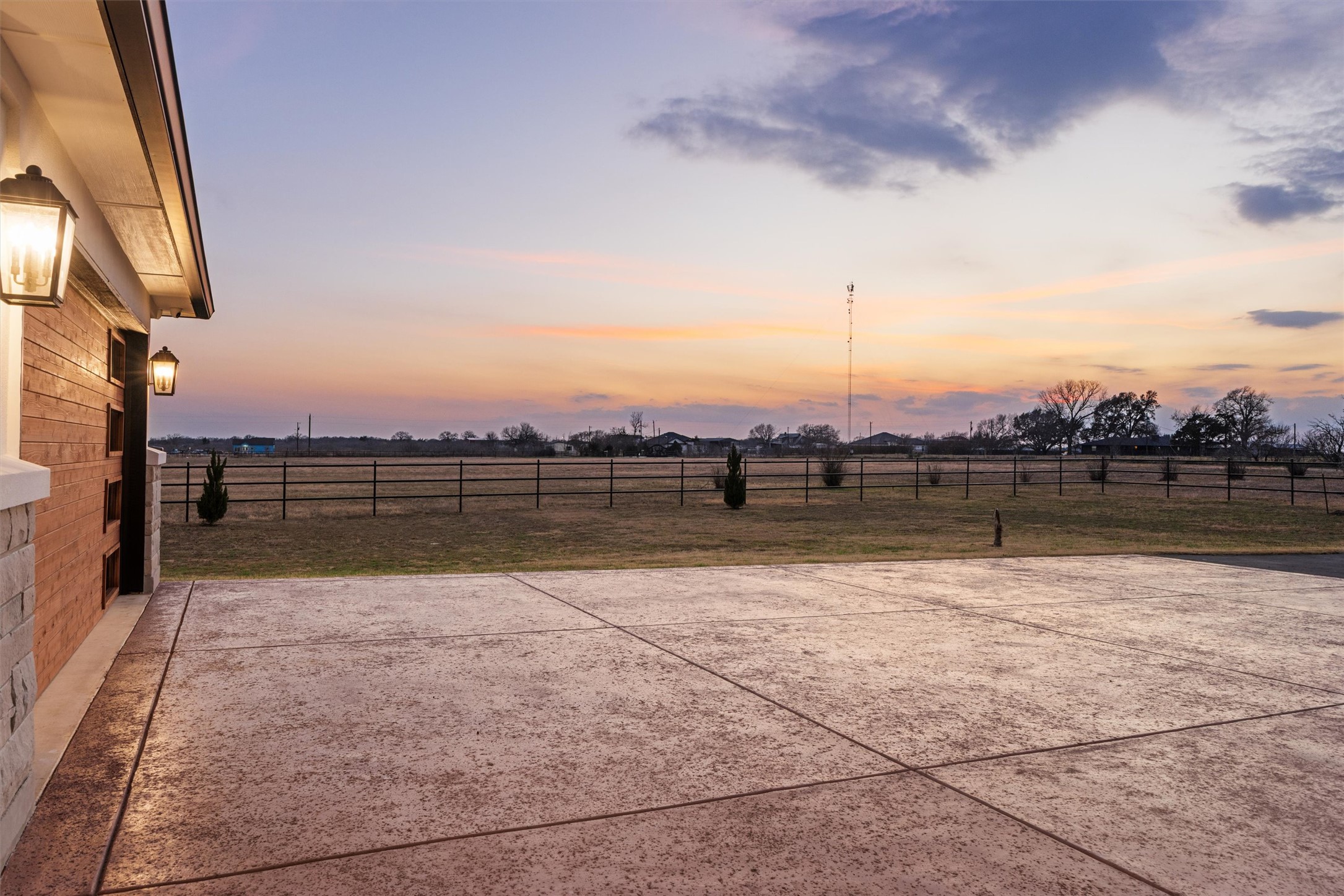 178 Balch Road Elgin, TX 78621 - Photo 39 of 40 View of land at sunset front of the house.