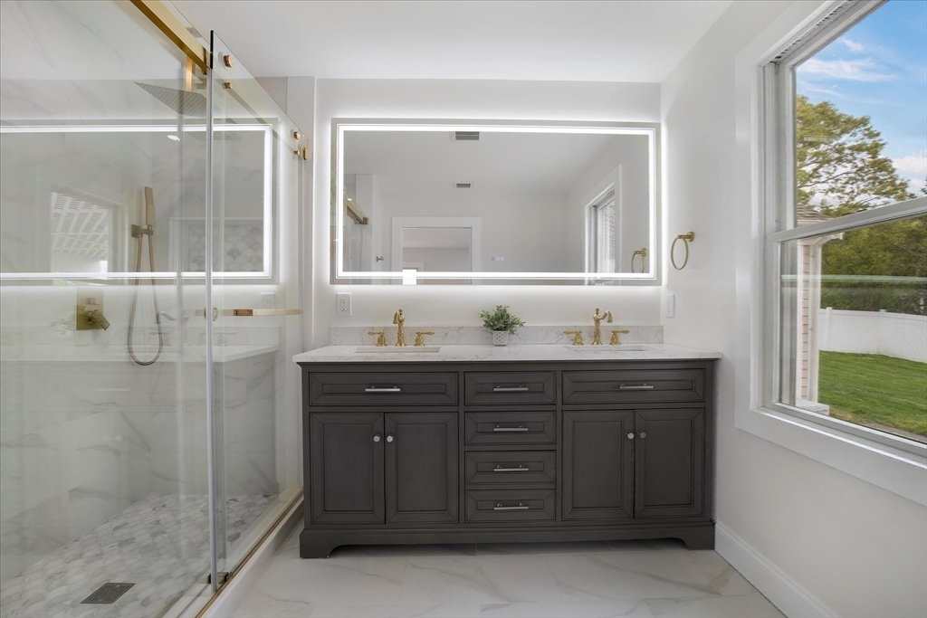 200 Sixth Avenue Barnstable, MA 02601 - Photo 20 of 39 a bathroom with a granite countertop sink mirror and double