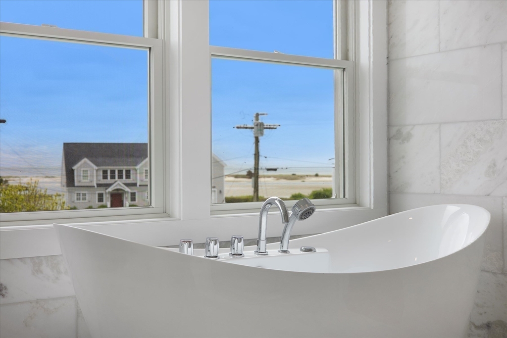 200 Sixth Avenue Barnstable, MA 02601 - Photo 31 of 39 a view of a bathroom with a sink and a mirror