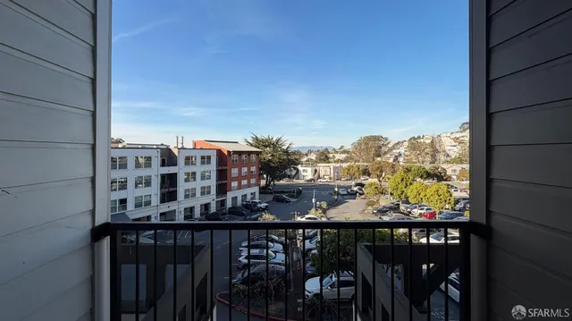 a bathroom with a shower and a sink