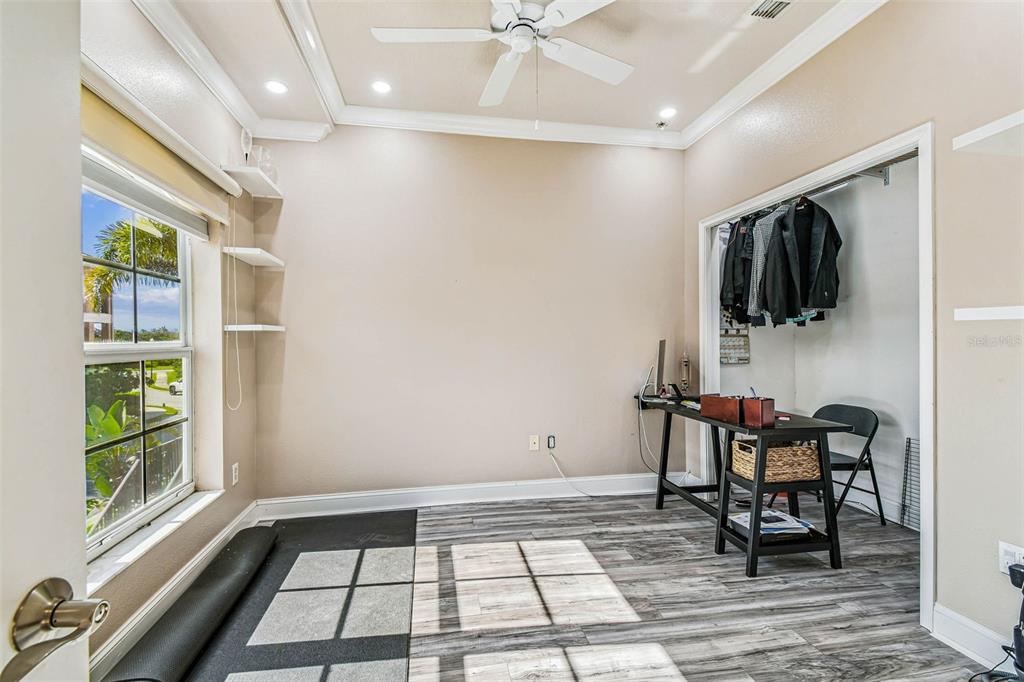 6533 Channelside Drive New Port Richey, FL 34652 - Photo 15 of 44 a room with furniture and a window