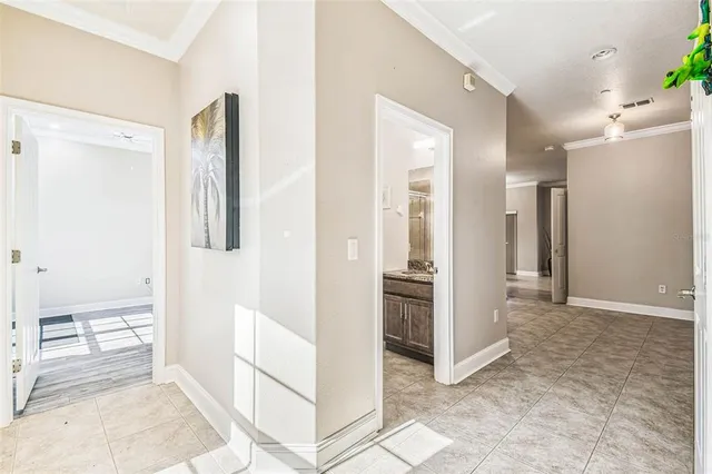 a view of a bathroom with sink and shower