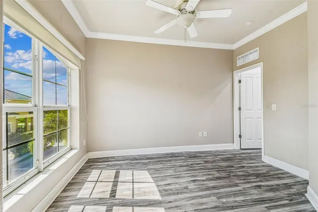 a view of an empty room and window