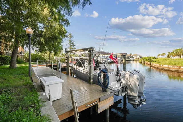 a view of a chairs and table on the deck