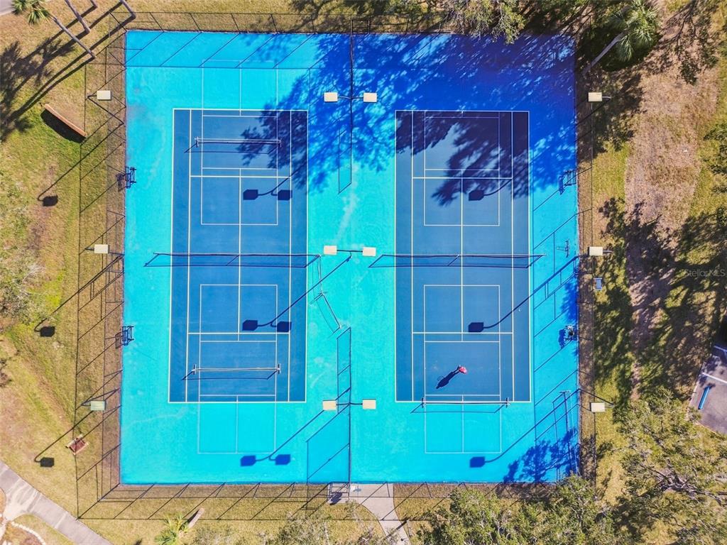 6533 Channelside Drive New Port Richey, FL 34652 - Photo 41 of 44 a view of a house with a small yard