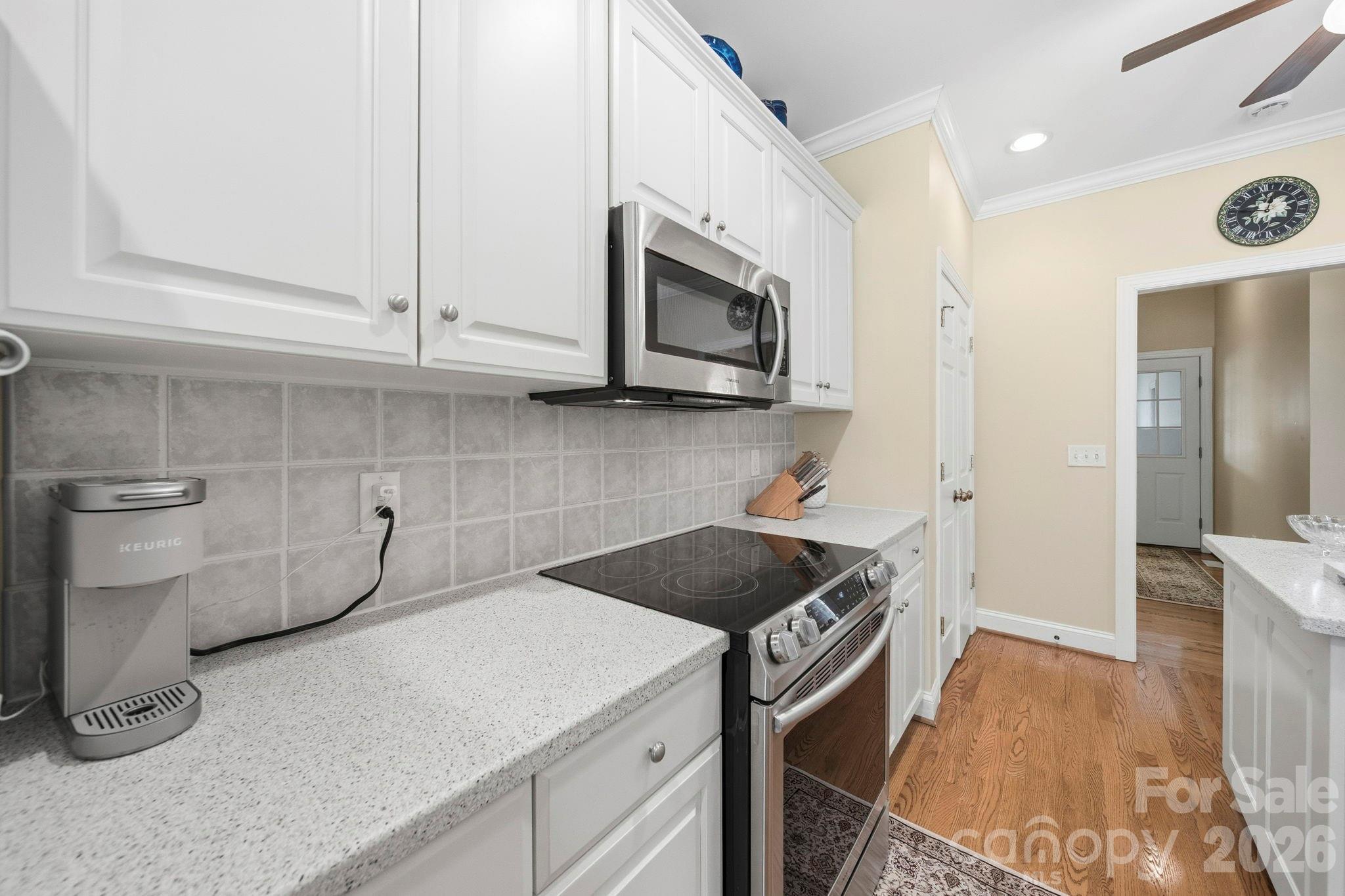 2909 Lakeshore Drive Chester, SC 29706 - Photo 20 of 44 a kitchen with a sink a stove and cabinets