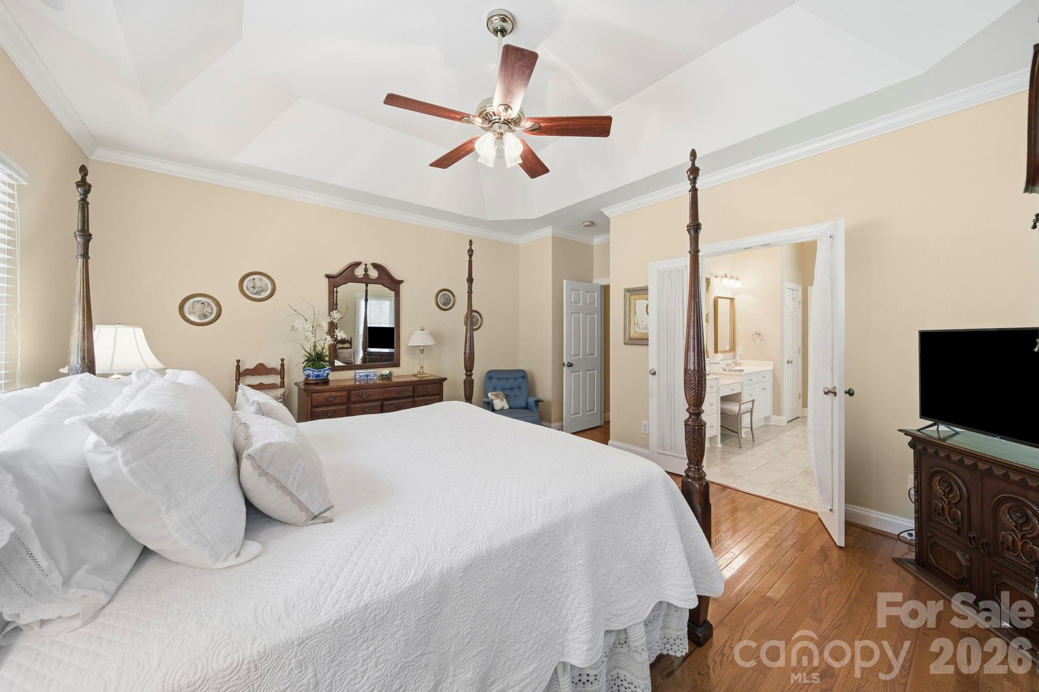 2909 Lakeshore Drive Chester, SC 29706 - Photo 30 of 44 a bedroom with a bed and a flat screen tv