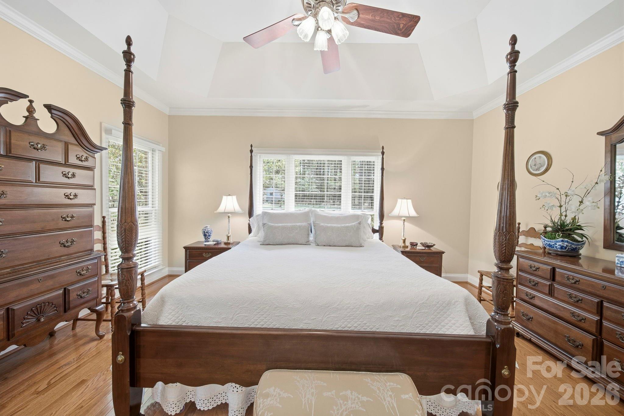 2909 Lakeshore Drive Chester, SC 29706 - Photo 35 of 44 a bedroom with a large bed and a chandelier