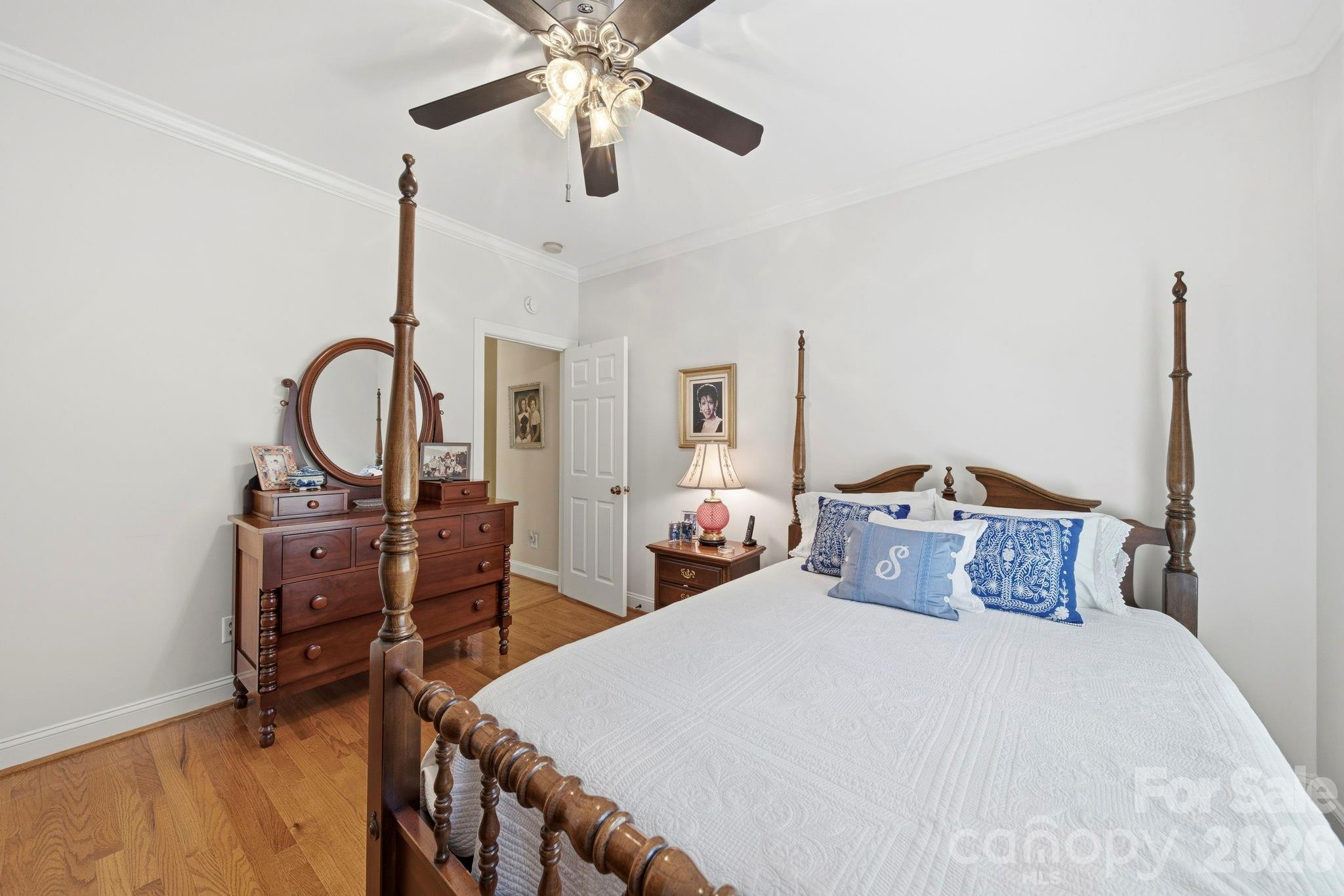 2909 Lakeshore Drive Chester, SC 29706 - Photo 38 of 44 a bedroom with a bed and a chandelier