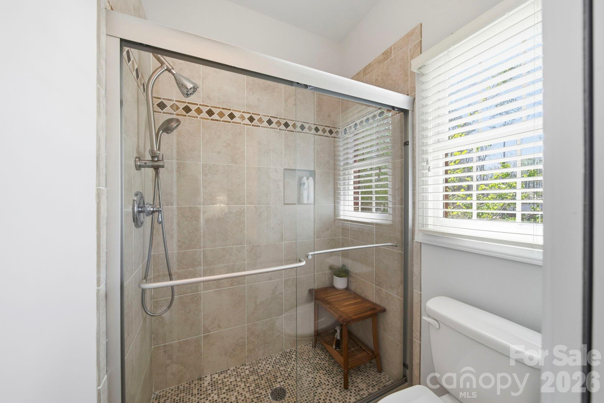 2909 Lakeshore Drive Chester, SC 29706 - Photo 40 of 44 a bathroom with a shower and a toilet