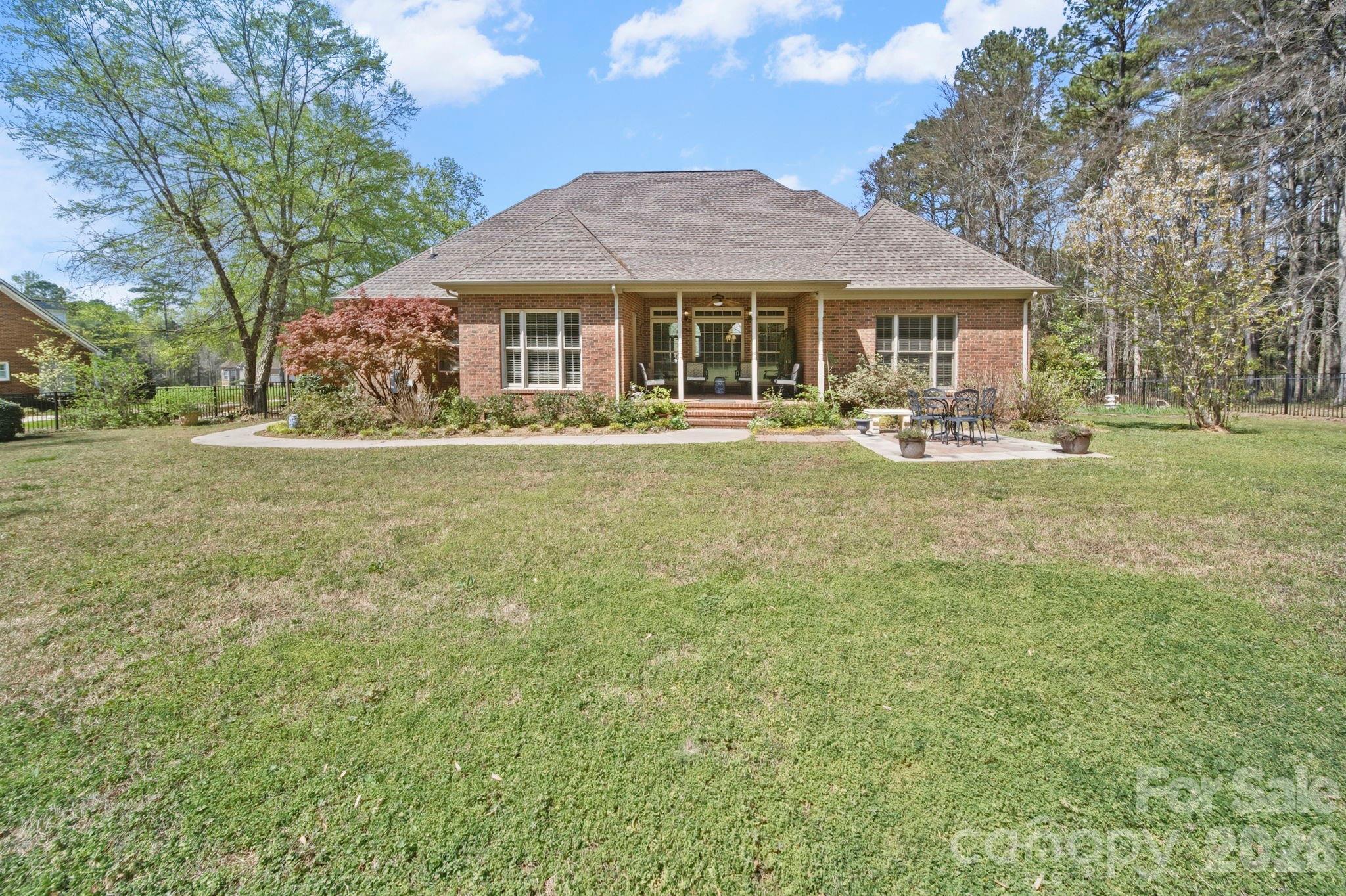 2909 Lakeshore Drive Chester, SC 29706 - Photo 7 of 44 a front view of a house with yard porch and furniture
