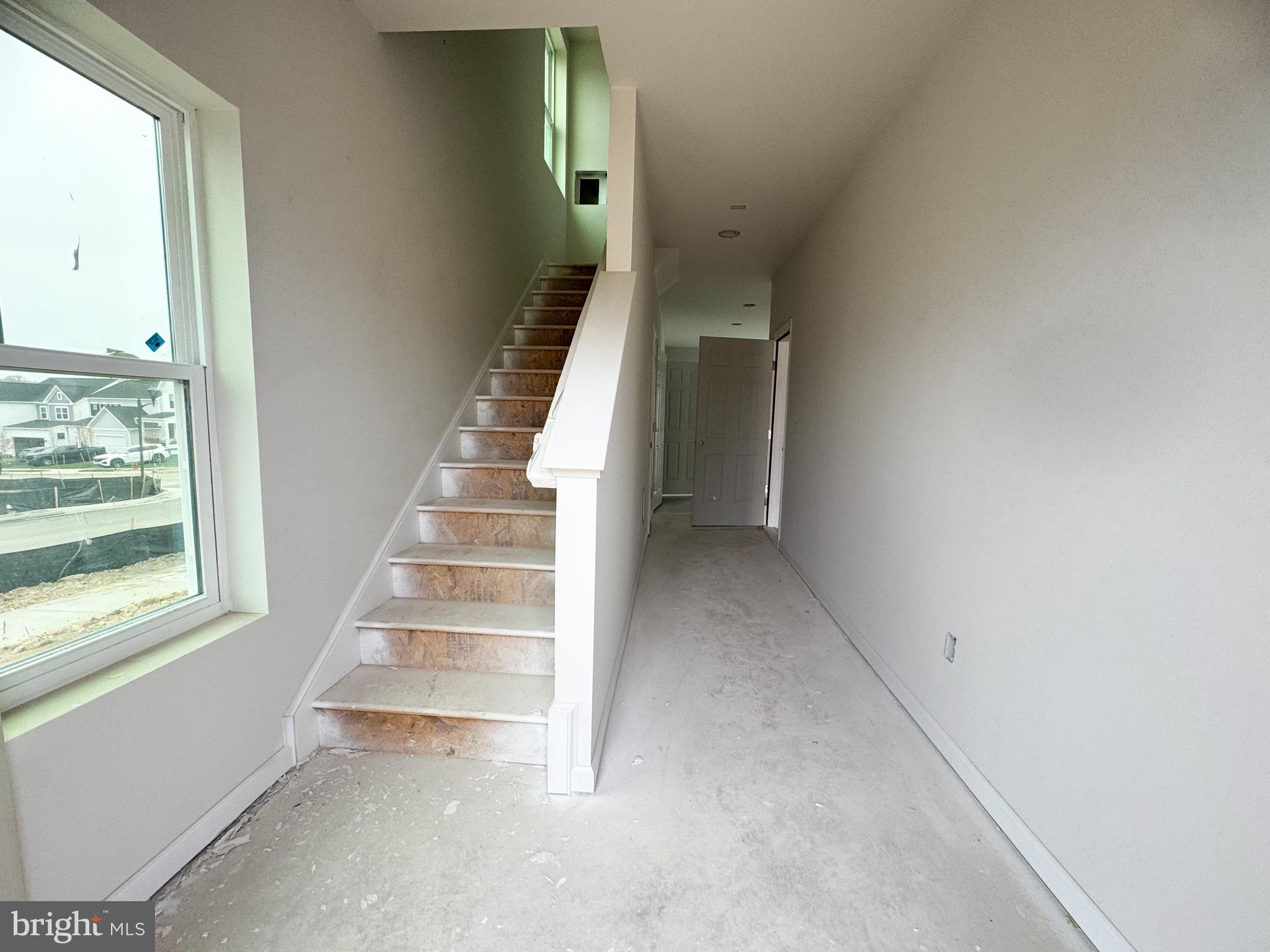 105 Gelding Way Stephenson, VA 22656 - Photo 2 of 16 a view of entryway and hall with wooden floor