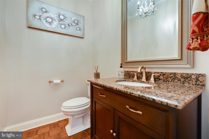 2162 Landis Valley Road Lancaster, PA 17601 - Photo 17 of 27 a bathroom with a granite countertop sink and a toilet
