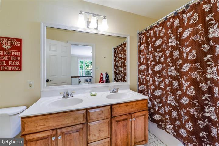 2162 Landis Valley Road Lancaster, PA 17601 - Photo 24 of 27 a bathroom with a sink and a mirror