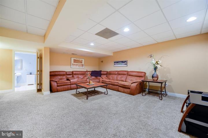 2162 Landis Valley Road Lancaster, PA 17601 - Photo 25 of 27 a living room with furniture and a chandelier