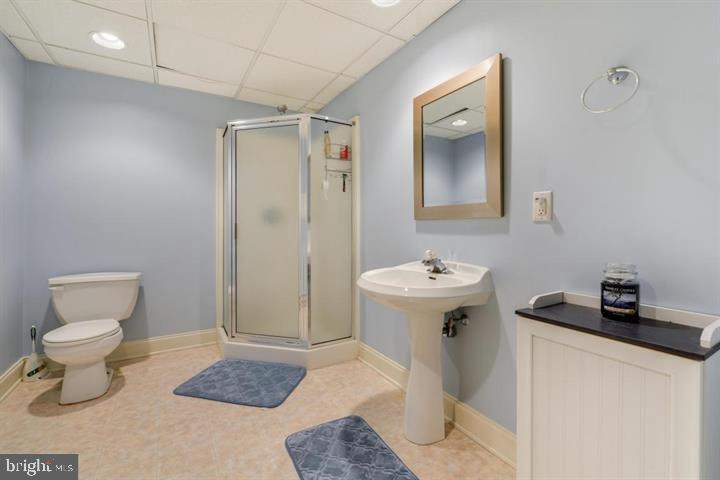 2162 Landis Valley Road Lancaster, PA 17601 - Photo 27 of 27 a bathroom with a toilet sink and mirror