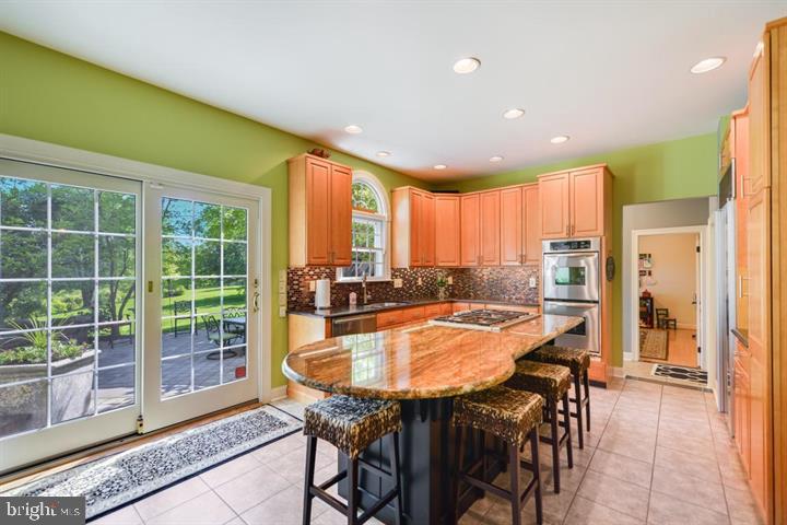 2162 Landis Valley Road Lancaster, PA 17601 - Photo 8 of 27 a dining room with furniture and a floor to ceiling window