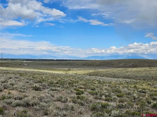 a view of an ocean and mountain