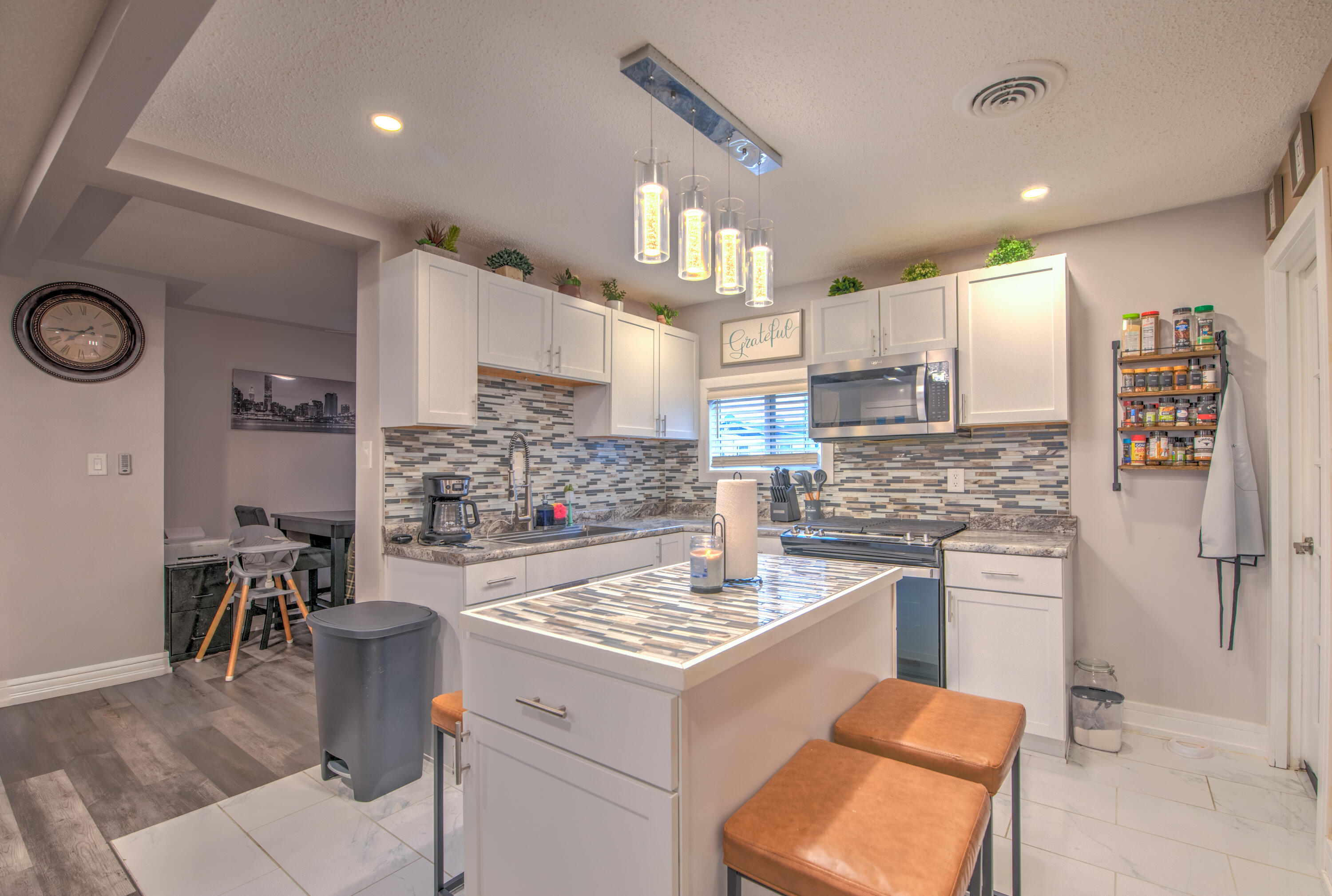 2080 Wright Street Gary, IN 46404 - Photo 6 of 20 a kitchen with a stove cabinets and a refrigerator