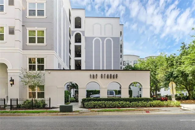 a front view of a building with garden