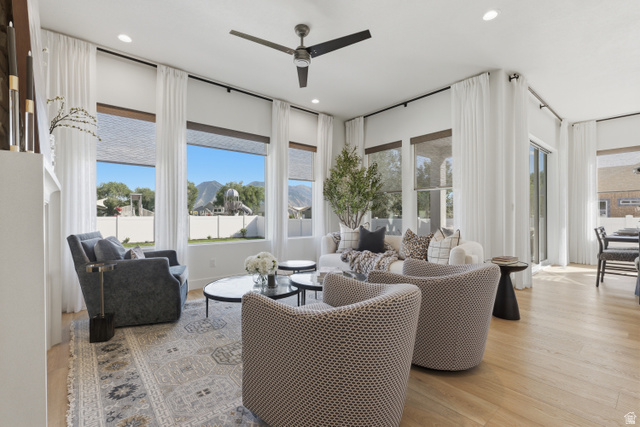 2559 West Aurora Avenue Mapleton, UT 84664 - Photo 13 of 60 Spacious living area featuring light wood-finish flooring, recessed lighting, and a ceiling fan