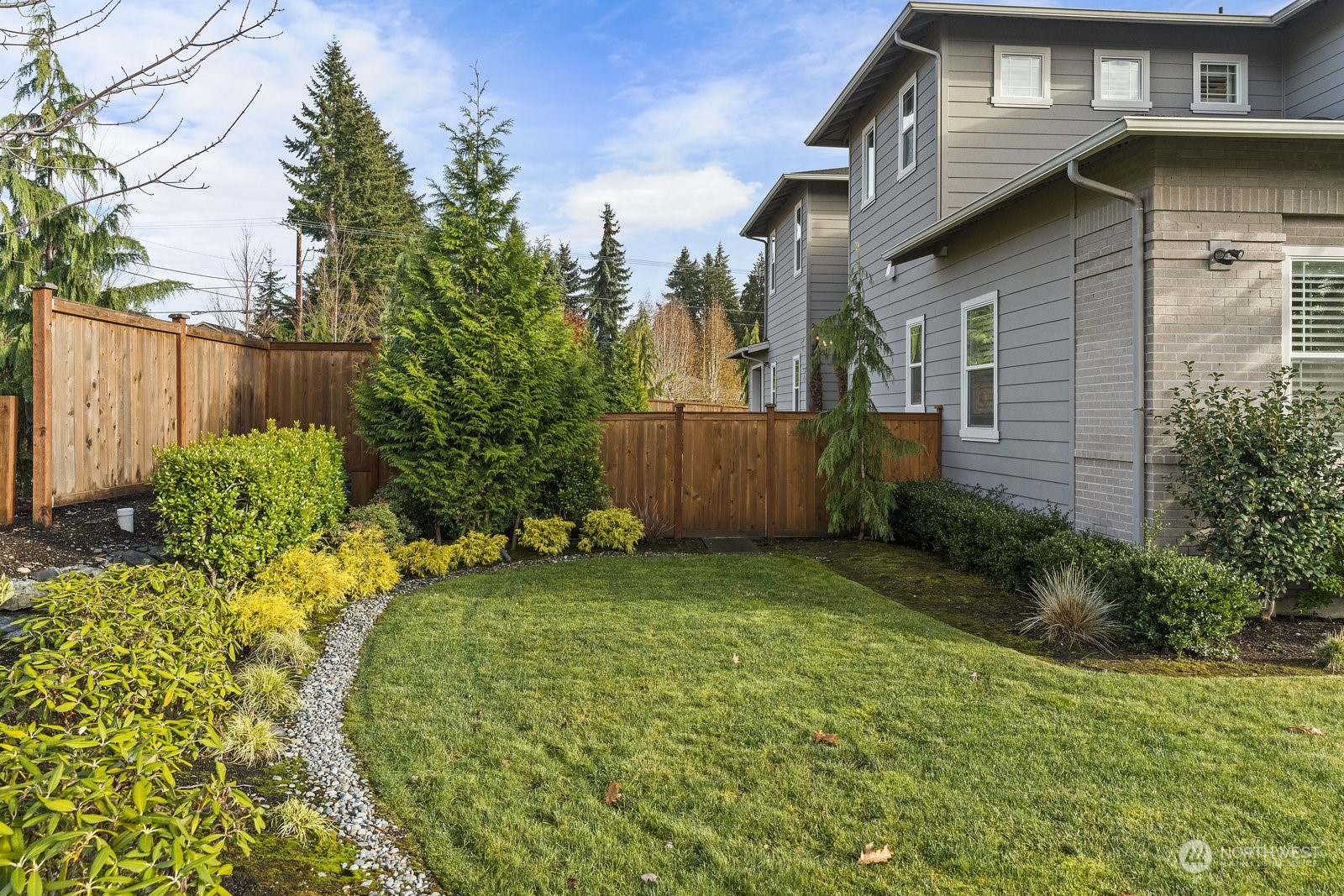 21803 34th Drive Southeast Bothell, WA 98021 - Photo 3 of 40 a backyard of a house with lots of green space