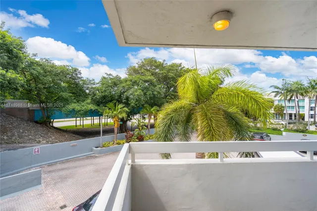 a view of a swimming pool and a yard