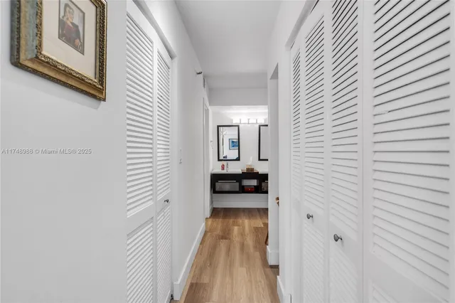 a view of a hallway with a furniture