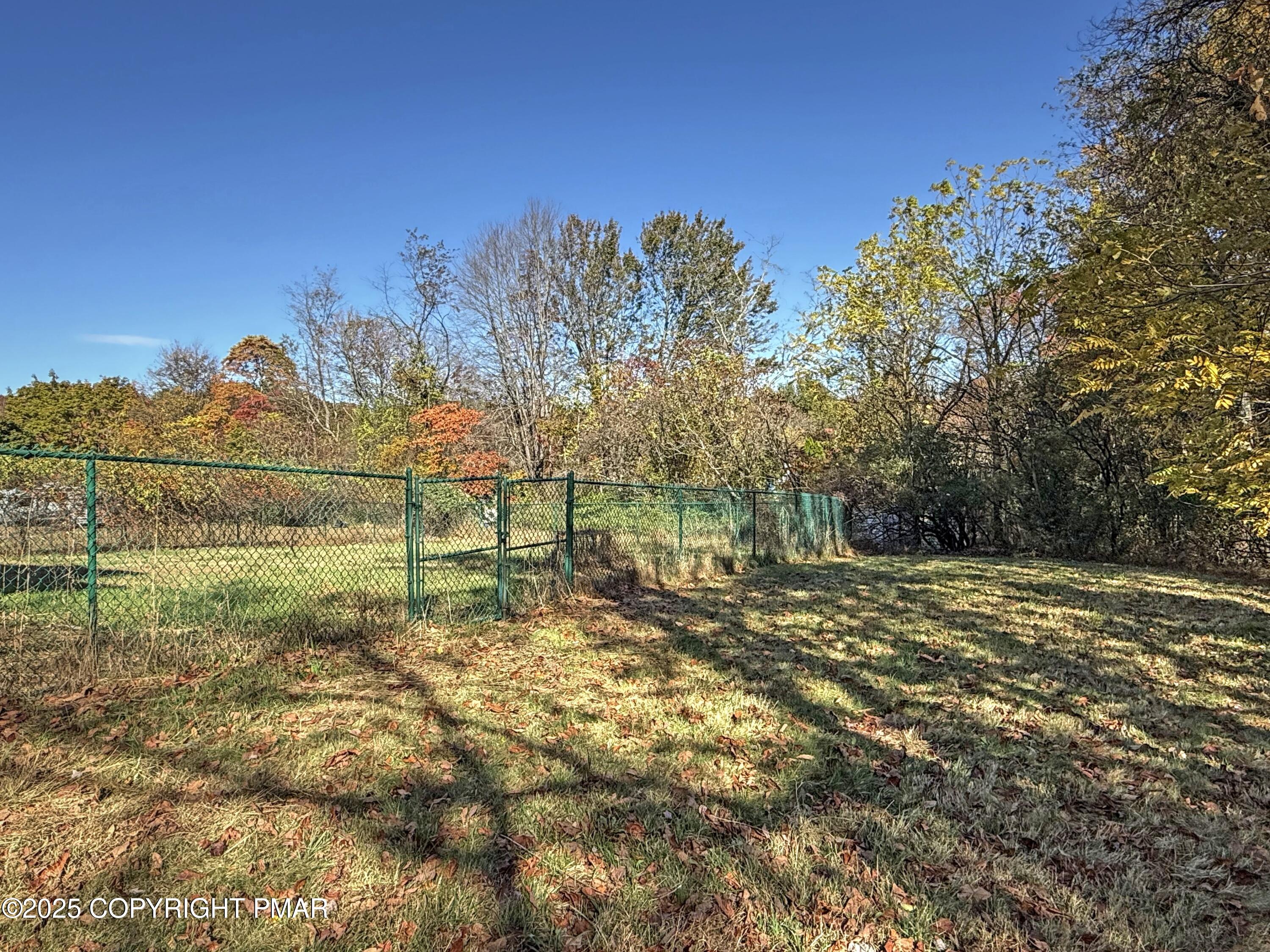 120 Upper Green Hill Road Kunkletown, PA 18058 - Photo 17 of 19 a view of a yard with an trees