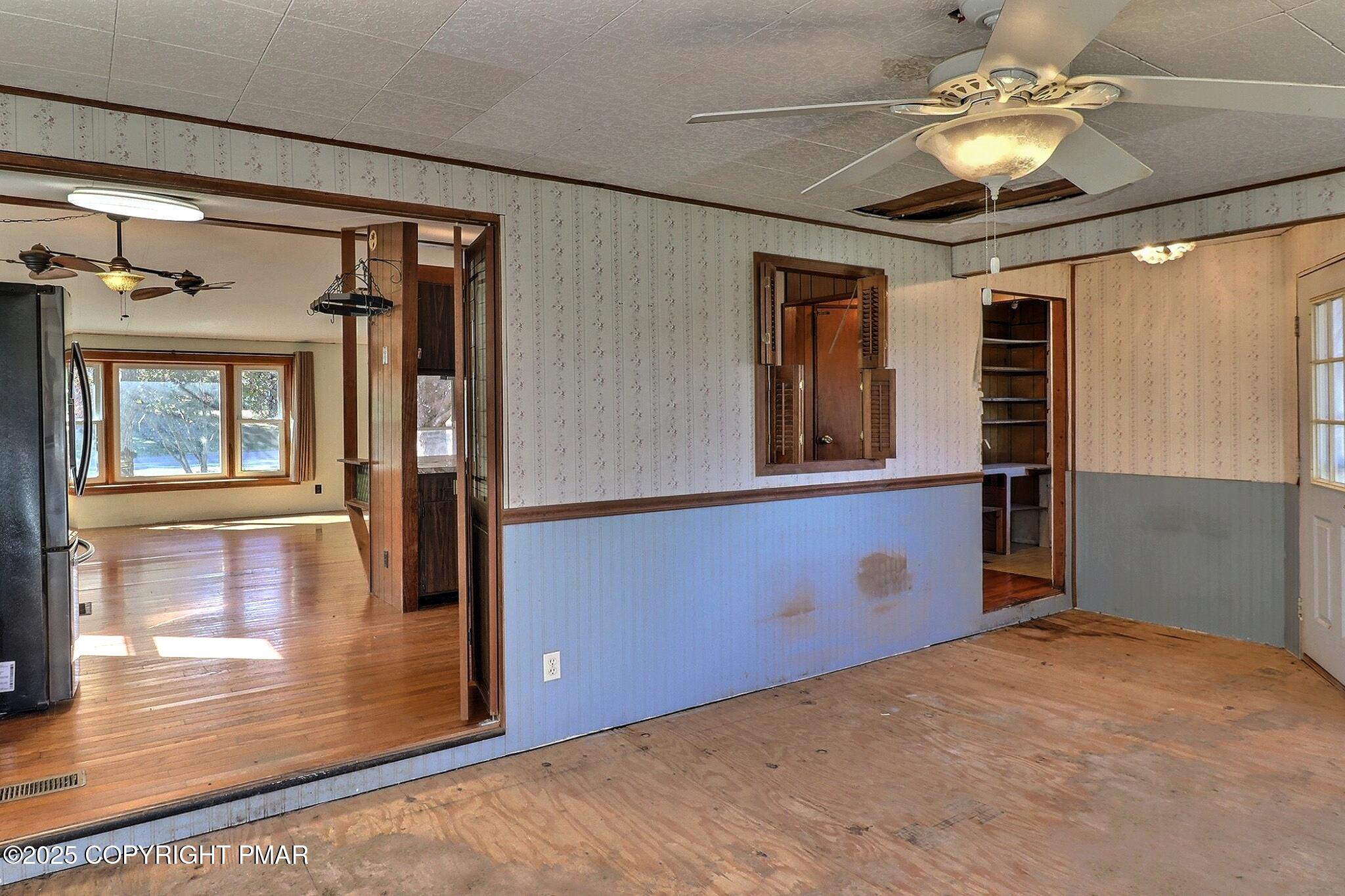 120 Upper Green Hill Road Kunkletown, PA 18058 - Photo 8 of 19 a view of a livingroom with a chandelier