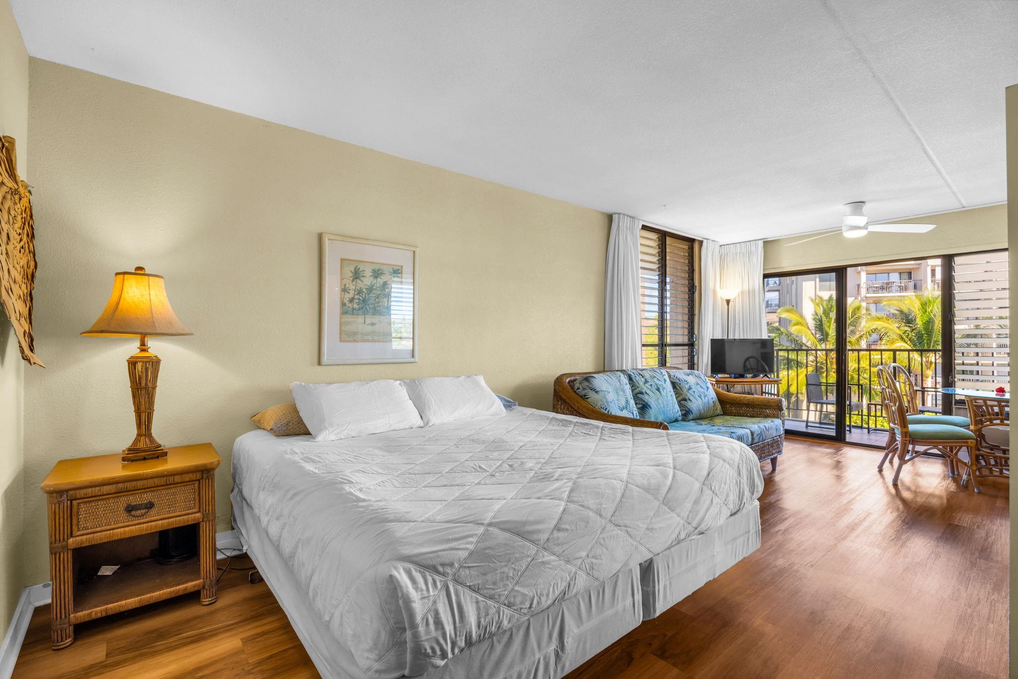 2531 South Kihei Road, Unit C620 Kihei, HI 96753 - Photo 15 of 38 a bedroom with a bed and large windows