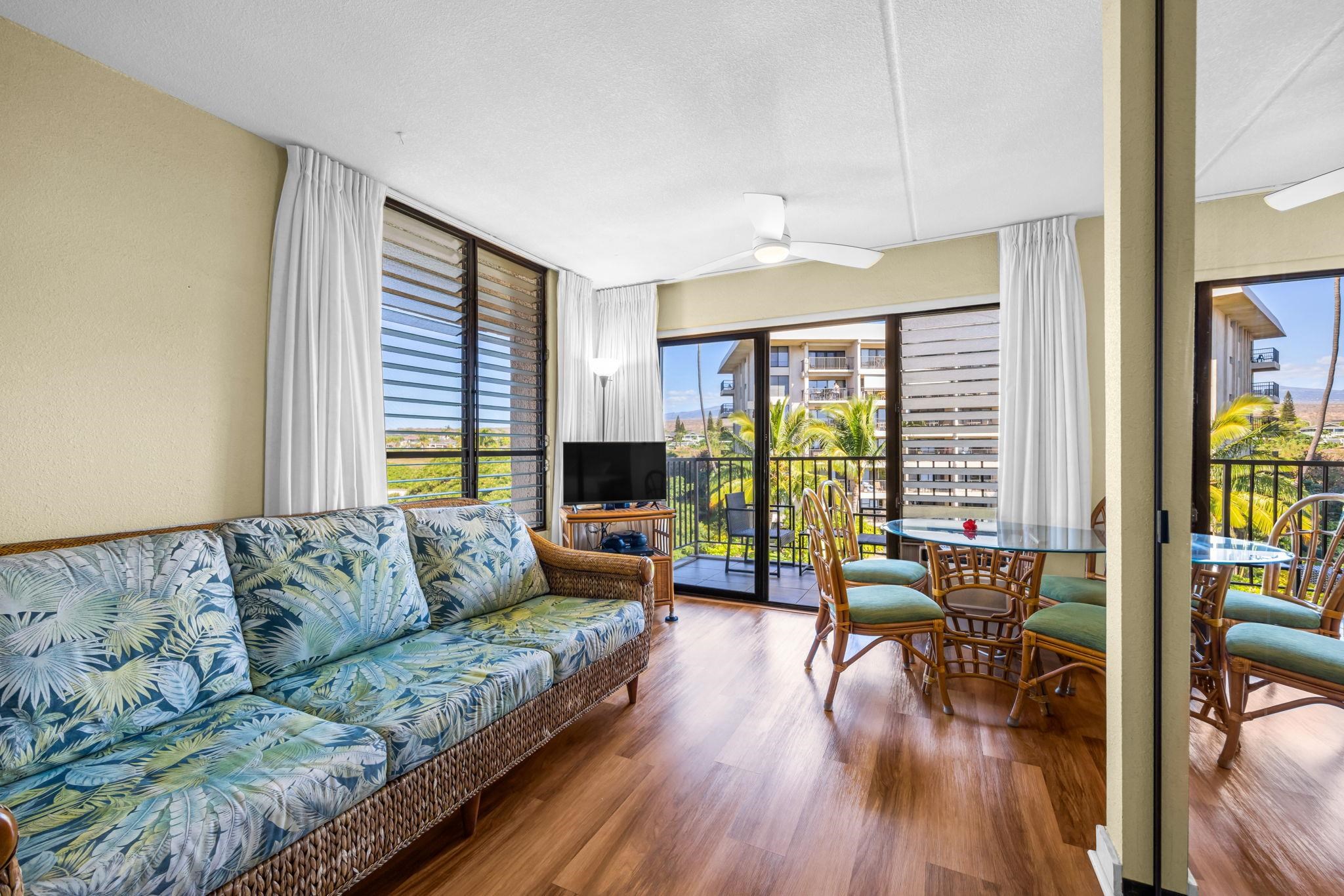 2531 South Kihei Road, Unit C620 Kihei, HI 96753 - Photo 19 of 38 a living room with furniture and floor to ceiling windows
