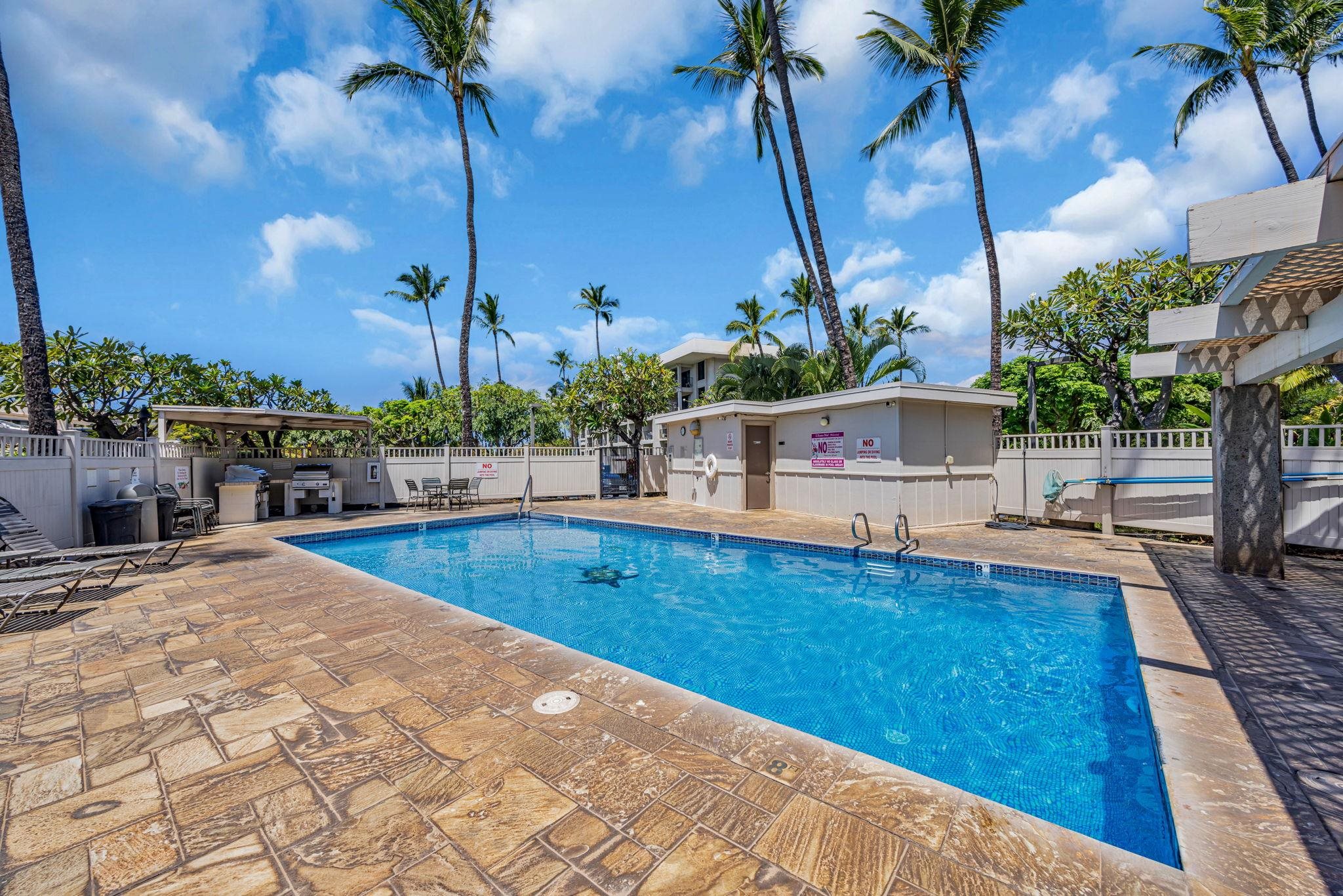 2531 South Kihei Road, Unit C620 Kihei, HI 96753 - Photo 3 of 38 a swimming pool with outdoor seating and yard