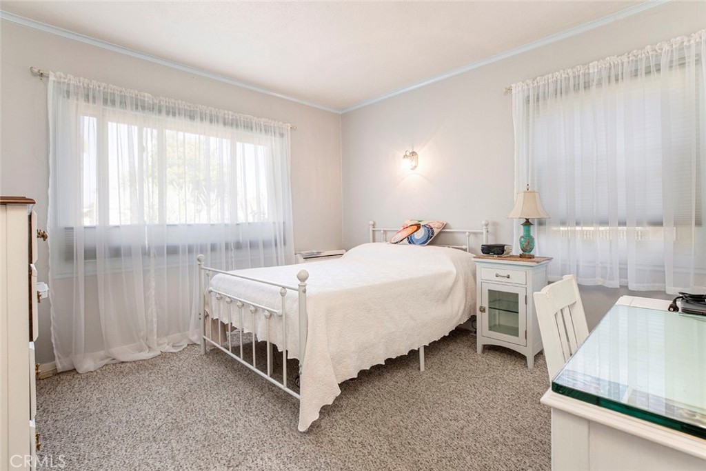 1130 Park Avenue Glendale, CA 91205 - Photo 26 of 75 a spacious bedroom with a bed and a sink