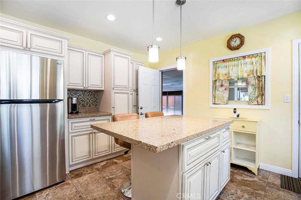 1130 Park Avenue Glendale, CA 91205 - Photo 34 of 75 a kitchen with stainless steel appliances granite countertop a sink stove and refrigerator
