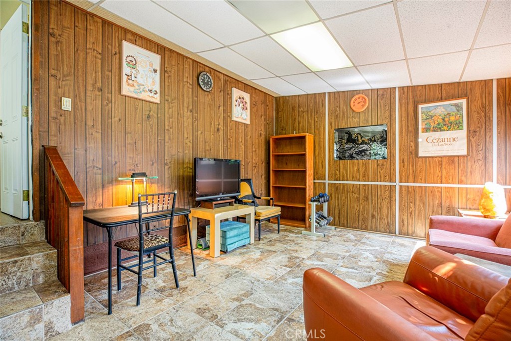 1130 Park Avenue Glendale, CA 91205 - Photo 68 of 75 a living room with furniture a flat screen tv and a window