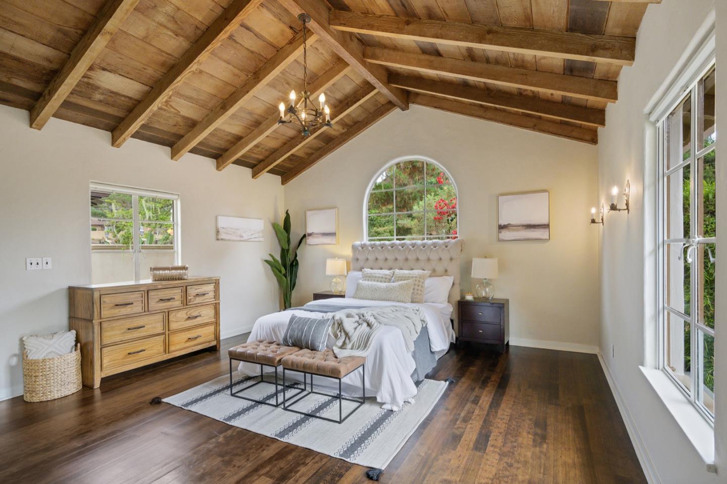 3080 Bird Rock Road Pebble Beach, CA 93953 - Photo 21 of 46 a bedroom with furniture and a window